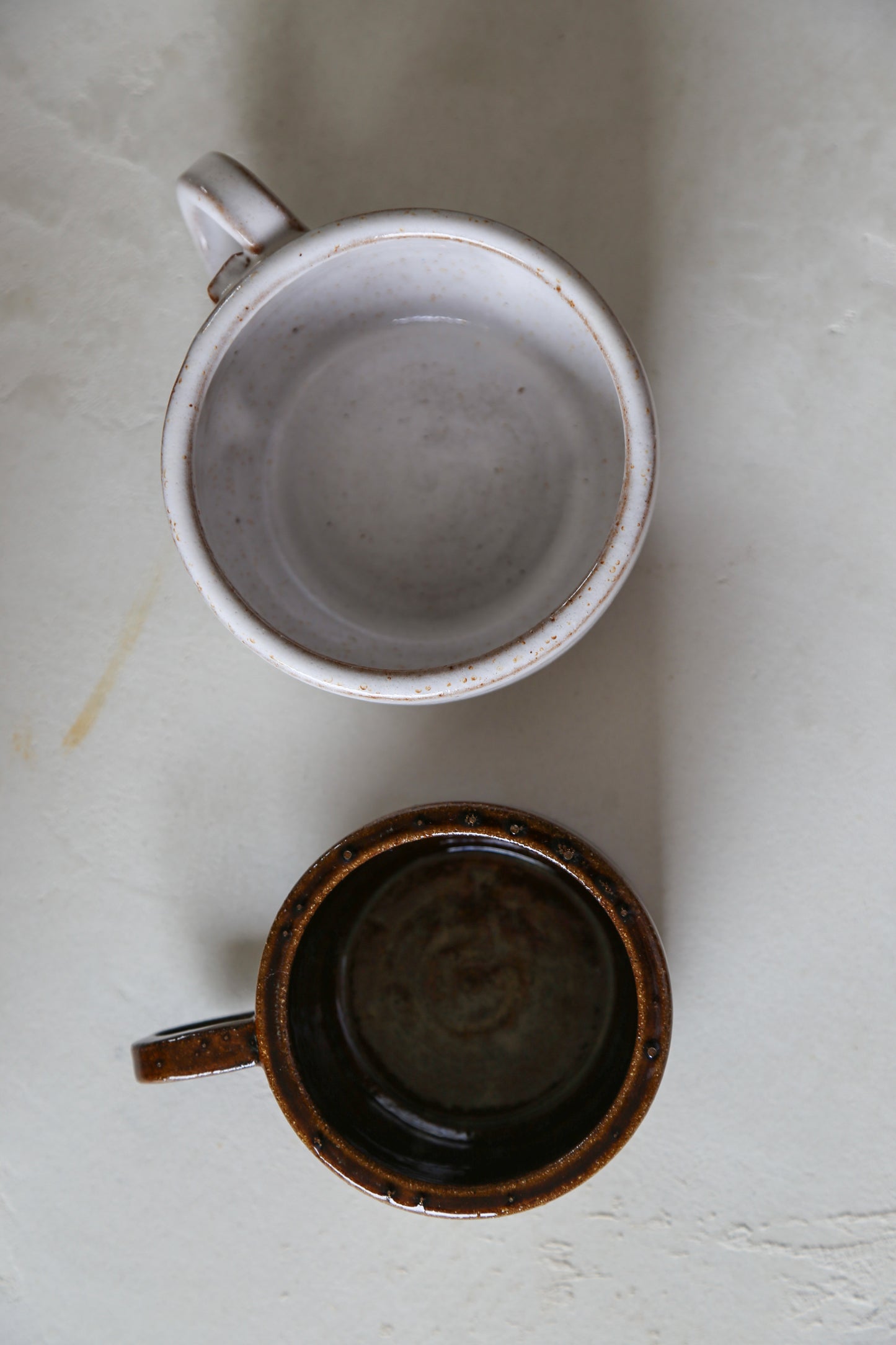 Cracked earth mug / dirty dishes