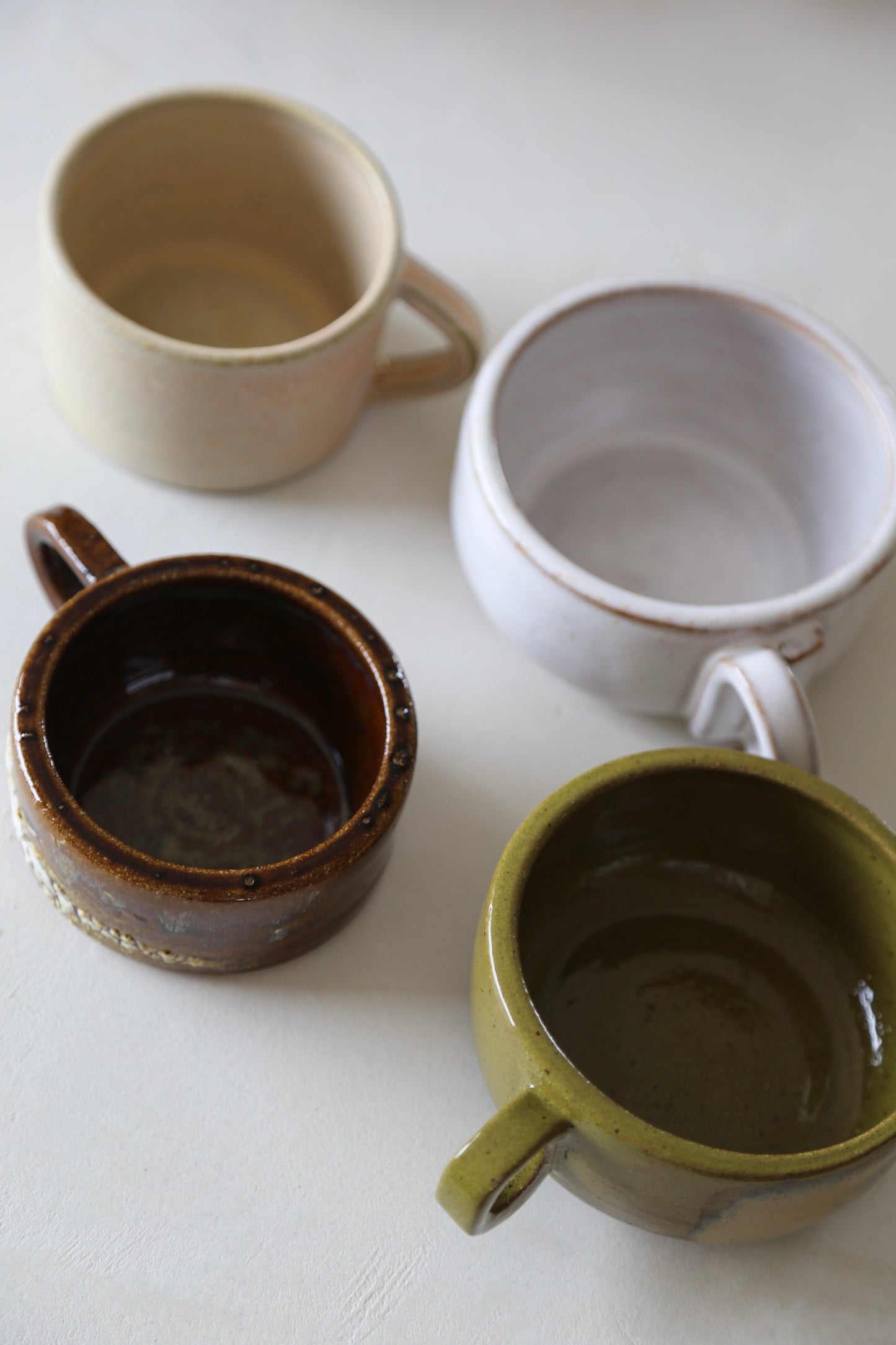Cracked earth mug / dirty dishes