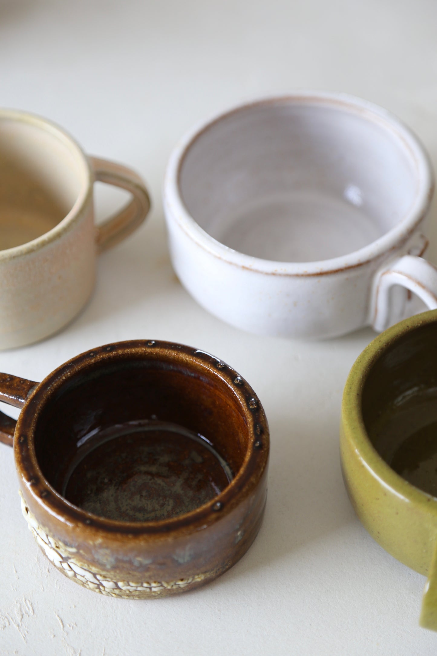 Cracked earth mug / dirty dishes